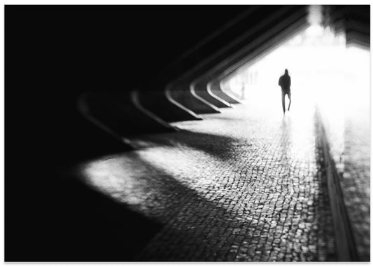 Man Walking Towards Light