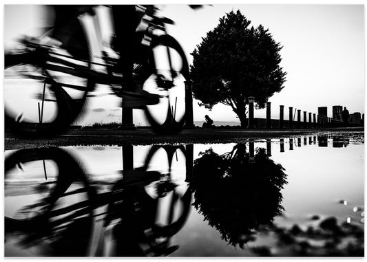 Blurred Cyclist Reflection