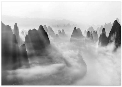 Light Rays Over Misty Peaks