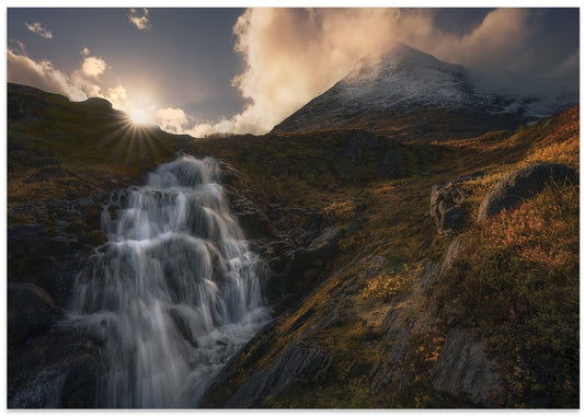 Sunlit Mountain Waterfall