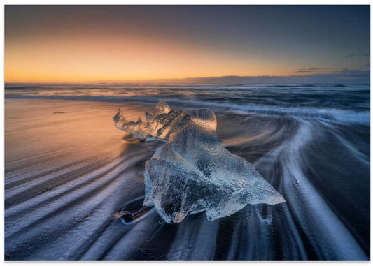 Glowing Ice on Black Sand
