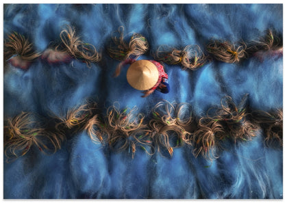 Worker Drying Blue Nets