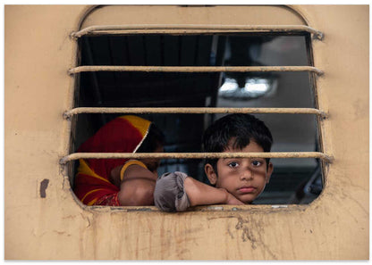 Pensive Boy Train Window