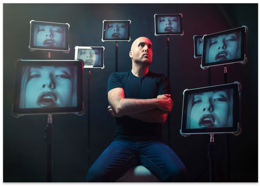 Man Amid Digital Faces